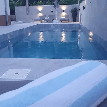 Rina- Heated Salt Water Pool